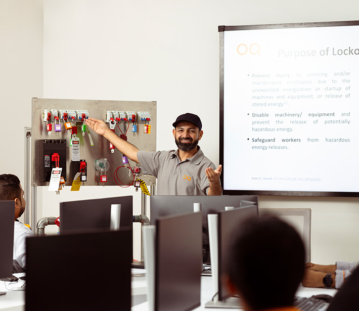 OQ employee giving a presentation